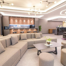 Modern lounge with grey sofa and bar area, The Lee Gardens, Causeway Bay, Hong Kong