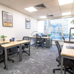 Shared office space with desks and ergonomic chairs, Hysan Avenue, Causeway Bay, Hong Kong